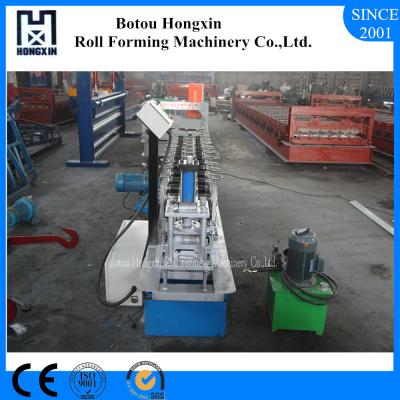 China 12 Rows Roller Shutter Door Roll Forming Machine For Embossing Sheet for sale