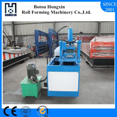 China Hydraulic Cutting Shutter Door Roll Forming Machine PLC Control System for sale