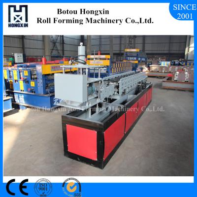 China Automatic Shutter Door Roll Forming Machine Flying Saw Cutting System for sale