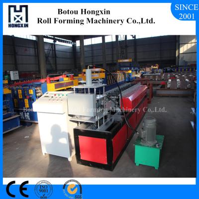 China Galvanized Profile Shutter Door Roll Forming Machine with PLC Control System for sale