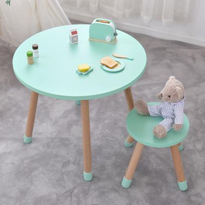 China Environmental Material Kids Table Nordic Style Kids Furniture Set Round Table Wooden Kids Study Table And Chair Set for sale