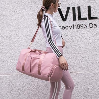 China Fashion Customized Large Capacity Pink Logo Gym Women Waterproof Duffel Bags Sports Travel Bag for sale