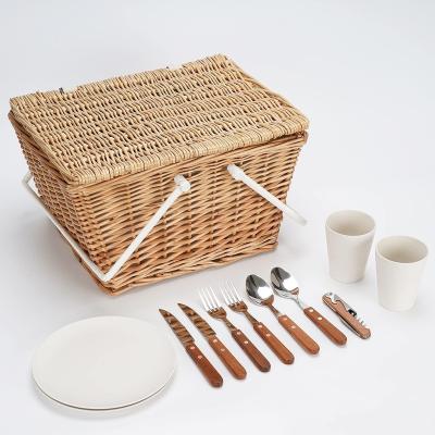 China Viable 2 Person Picnic Kit Vine Irregular Basket with Handle Tableware Set for Couples Picnic Dating Outdoor Event Picnic Basket Set for sale