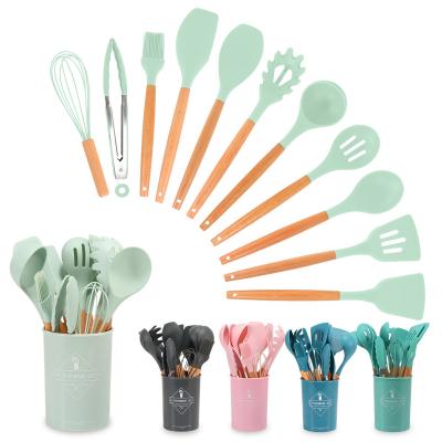 China Amazon Viable Hot Selling 12 Piece Silicone Spatula Handle Kitchen Tableware Cookware Wooden Serving Set Silicone Kitchen Tools for sale