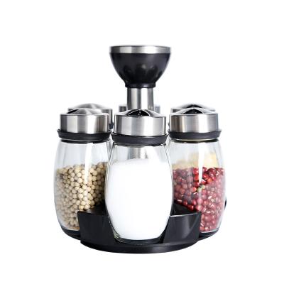 China Universal Viable Spice Container 7pcs Glass Pepper Seasoning Rotating Jar Set Spice Jar Holder Glass Spice Jar for sale