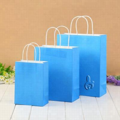 China Custom Made Eco-Friendly And Fashion Low Cost Brown Colored White Craft Paper Packaging Bag With Handle for sale