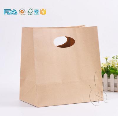 China Factory direct sale disposable high end custom logo brown kraft paper bag with die cut patch handle for sale