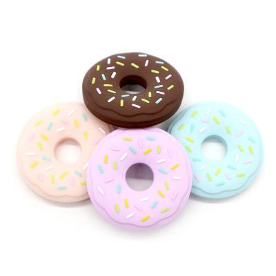 China Soft Toy Cheap Price Guaranteed Quality Food Grade Cookies Baby Donut Silicone Teether for sale