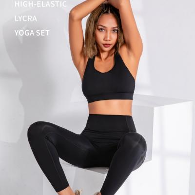 China Yogawear Gaiters Soft High Stretch Breathable Elastic Waisted Women High Tummy Control Tight Pants 25 Inches With Adjustable Sports Bra for sale