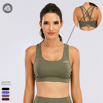 China Breathable Strappy Back Crop Top Women Workout Sports Bra Top Green Fashion Sports Bra for sale