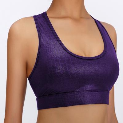 China Wholesale Breathable Unique Embossing Metallic Shiny Top Leopard Print Women Sports Bra Fashion Yoga Crop Top for sale