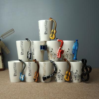 China Disposable Tarpul Creative Hand Painted Musical Instruments Handle Coffee Tea Milk Cups Music Ceramic Mug for sale