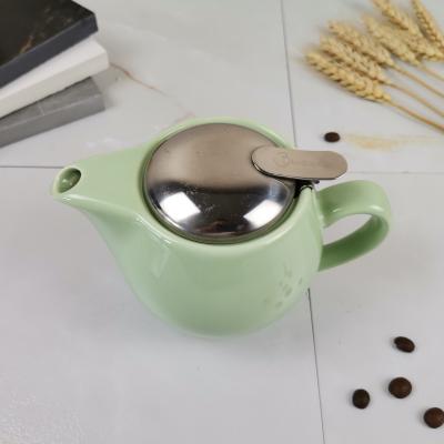 China Sustainable Tarpul Glazed Color Mini Teapot Ceramic Tea Pot Kettle With Strainer And Infuser for sale