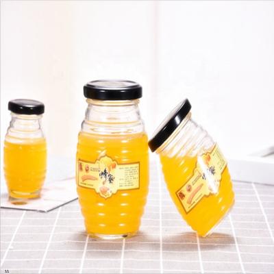 China Viable in Bulk Empty Honey Jam Jars Glass Storage Containers for Food Bottles for sale