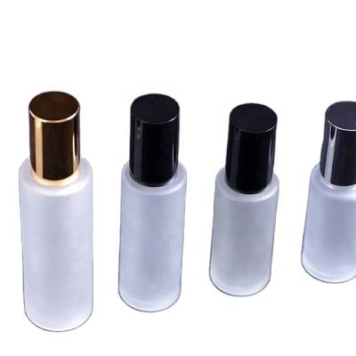 China Cosmetic Frosted Glass Lotion Bottles Cosmetic Bottles For Pumping Spray Black for sale