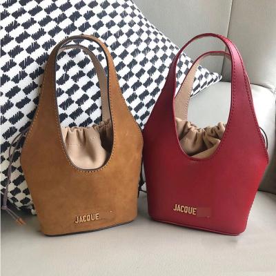 China 2021 Fashion Hot Selling PU Canvas Handbag Ladies Simple Design Leather Bucket Bag Large Fashionable Lightweight Luxury Shoulder Bag for sale