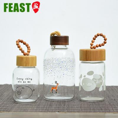 China Sustainable Cute Custom Mini Bottles For Kids Premium Glass Water Bottle for sale