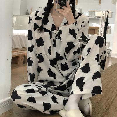 China Factory price hot sale QUICK DRY white cow custom printed ladies pajamas spring and autumn long sleeve two piece home service for sale