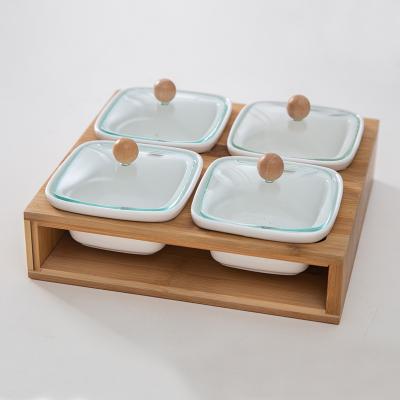 China Sustainable Food Ceramic Dip Bowls With Bamboo Paddles Divided Serving Tray Snack Serving Tray With 4 Compartments for sale