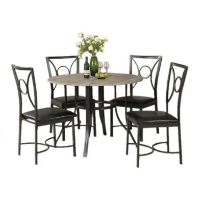 China Simple Dining Chair Set Round Table And MDF Table Top And PU Chair Metal Dining Set for sale