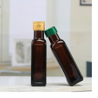 China Green Glass Edible Oil 100ml Small Capacity Bottle Of Oil For Kitchen Dispensing for sale