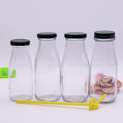 China Food Storage 200ml/250ml/300ml/500ml 200ml Juice Milk Glass High Quality Transparent Drinking Bottle for sale