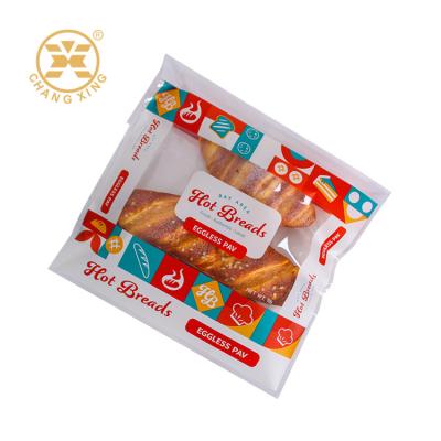 China Custom Logo Printed PET PE Bakery Bread Packaging Bags Mini Cake Food Packaging Bag for sale