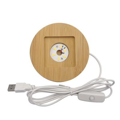 China Modern Low Circle LED Lamp Wooden Lamp Holder Wooden USB Chargeing Outlet Factory Display Stand for sale