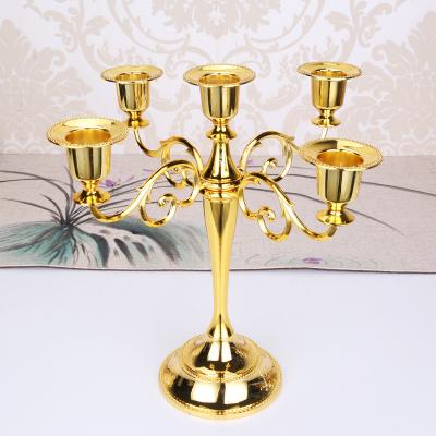 China Luxury High Quality Classic Gold Copper Candle Holder Personalized Home Decor Wedding Party Candle Holder for sale