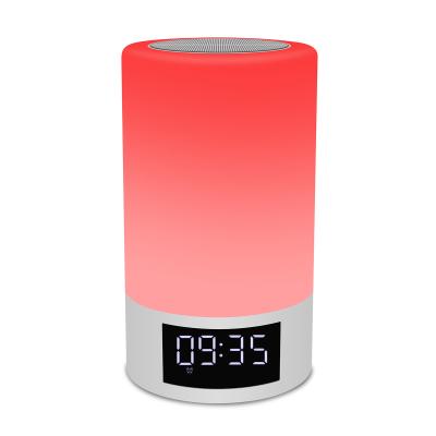 China Wireless Colorful Portable Touch Music Table Lamp Flame Wireless Speaker With FM Radio for sale