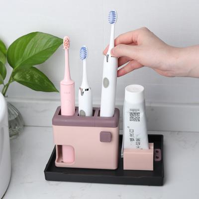 China Sustainable Creative Wall Mounted Plastic Toothbrush Holder And Sundries In Bathroom for sale