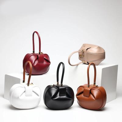 China Fashion New Quality Genuine Leather Women's Bucket Handbags Ladies Biscuit Handbag Vintage Top-handle Bell Shape Solid Tote Bags for sale