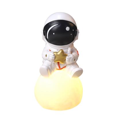 China 2021 Handmade Luxury Planet Astronaut Mood Lamp Led Night Lamp New for sale