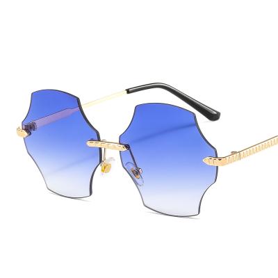 China Fashion Rimless Personality Color Irregular Metal Eight-sided Retro Rimless Sunglasses for sale