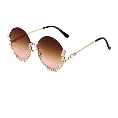 China Vintage Diamond Rhinestone Sunglasses Shade Rimless Round 2021 Fashion Sunglasses for sale