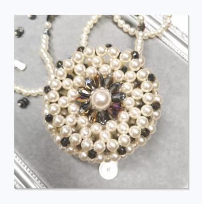 China 2021 fashion mini round cake 15*15 mini faux pearl beaded bag customized with high quality factory price for sale