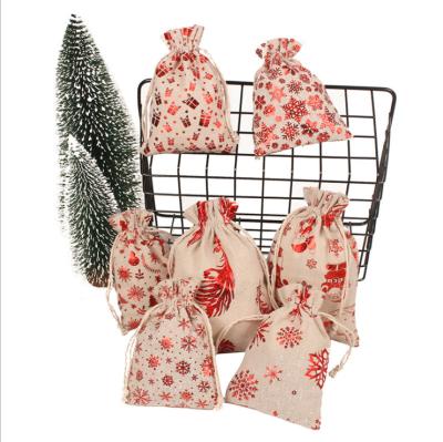 China High Quality Popular Christmas Holiday Party Decorations 2021Most Christmas Gift Bags Assorted Styles Drawstring Gift Christmas Candy Candy Bag for sale