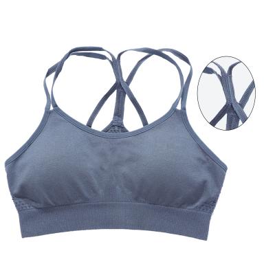 China Breathable Women's Ultra Light Strappy Traceless Sports Shockproof Bra For Yoga Pilates Training for sale