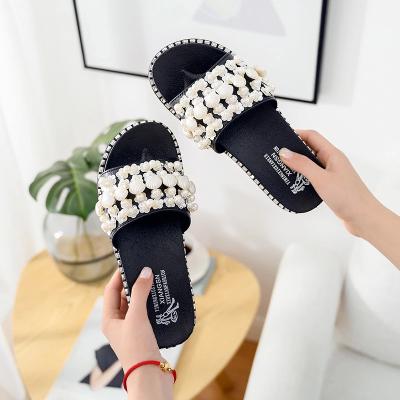 China Newest Pearl Flowers Sandals Girls Summer Black Pink Comfortable Anti-slippery Shell Flat Slippers For Women for sale