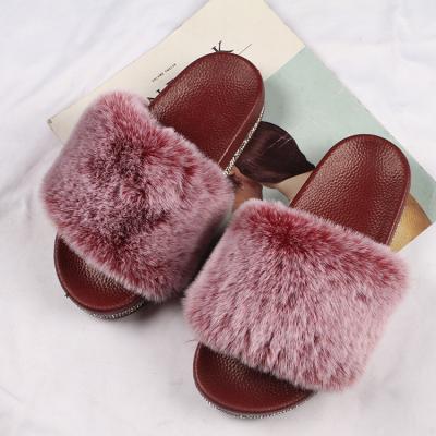 China New Arrival Factory Wholesale Winter Non-slip Fluffy Hairy Fur CUSHIONING Slippers Sheepskin Faux Fur Winter Women's Ladies Home Slippers for sale