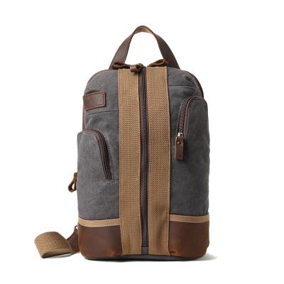 China Simple Durable Vintage Strap Backpack Canvas Leather Men Travel Sling Bag Trunk Fanny Pack Custom for sale