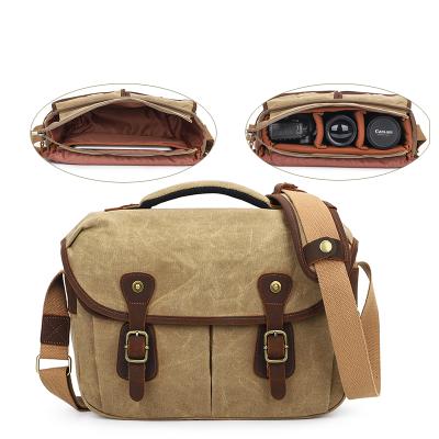 China Outdoor Multifunctional Waxed Canvas Travel Messenger Bag For Men With Removable Camera Insert Bag Mirrorless DSLR Bag for sale