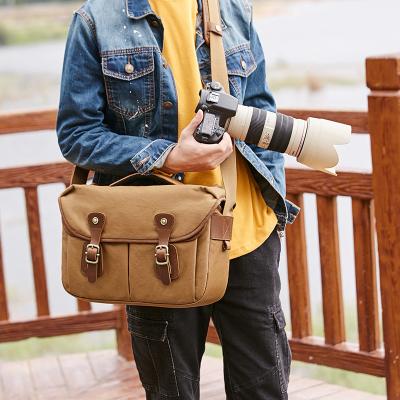 China Effects Protective Vintage Canvas Digital Camera Bag Waterproof Casual Messenger Shoulder Bag with Shockproof Insert and Tablet Pocket for sale