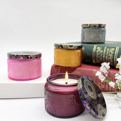 China Home Decoration Modern Style Colorful Embossed Candle Jar With Tinplate Lid Shiny White Purple Embossed Candle Holder For Decor for sale