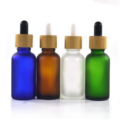 China Amber Glass Boston Round Cosmetic Bottle 10ml 30ml 50ml 100ml Frosted Amber Essential Oil Bottle With Graduated Measuring Glass Dropper for sale