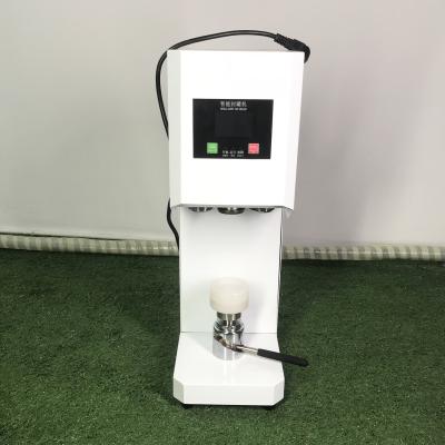 China manual beer can seamer soda can plastic bottle cap sealing machine à venda