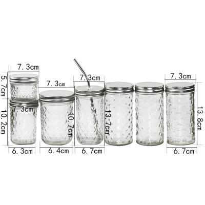 China Food Safe Wide Mouth 600ml Beverage Glass Mason Jar With Straw for sale