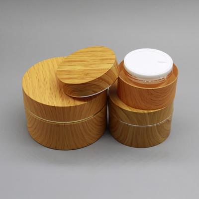 China Cosmetic jar set 15g 30g 50g 100g 200g 300g wood grain skin care double wall acrylic acrylic cream for sale