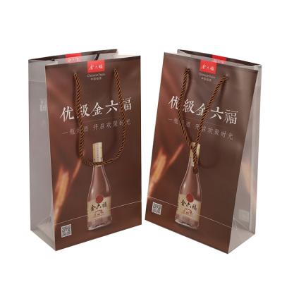 China Luxury Custom Handled Printed Logo Design Handle Plastic Wine Package Bag for sale