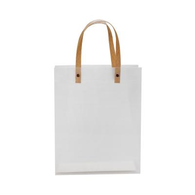 China Promotion Custom Handled Printed Logo Design Handle Plastic Cheap Gift Clothing Package Shopping Bag for sale